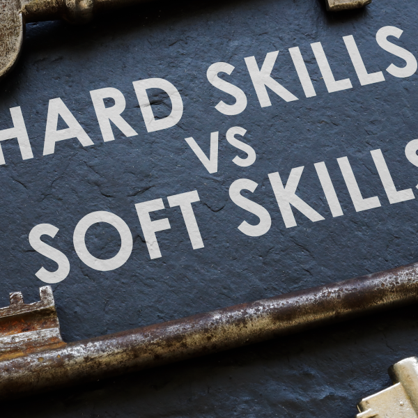 "Hard Sills vs Soft Skills" on blue background with keys