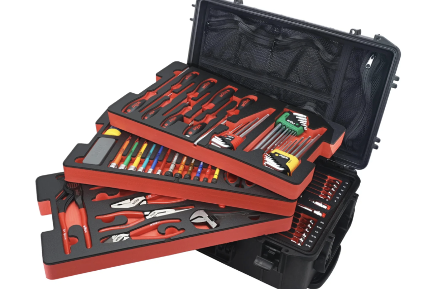 Rolling tool case has specific spot for all 158 tools it provides